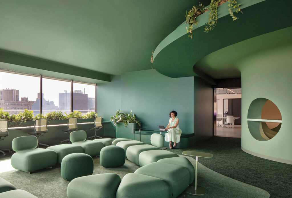 a deep green office lounge