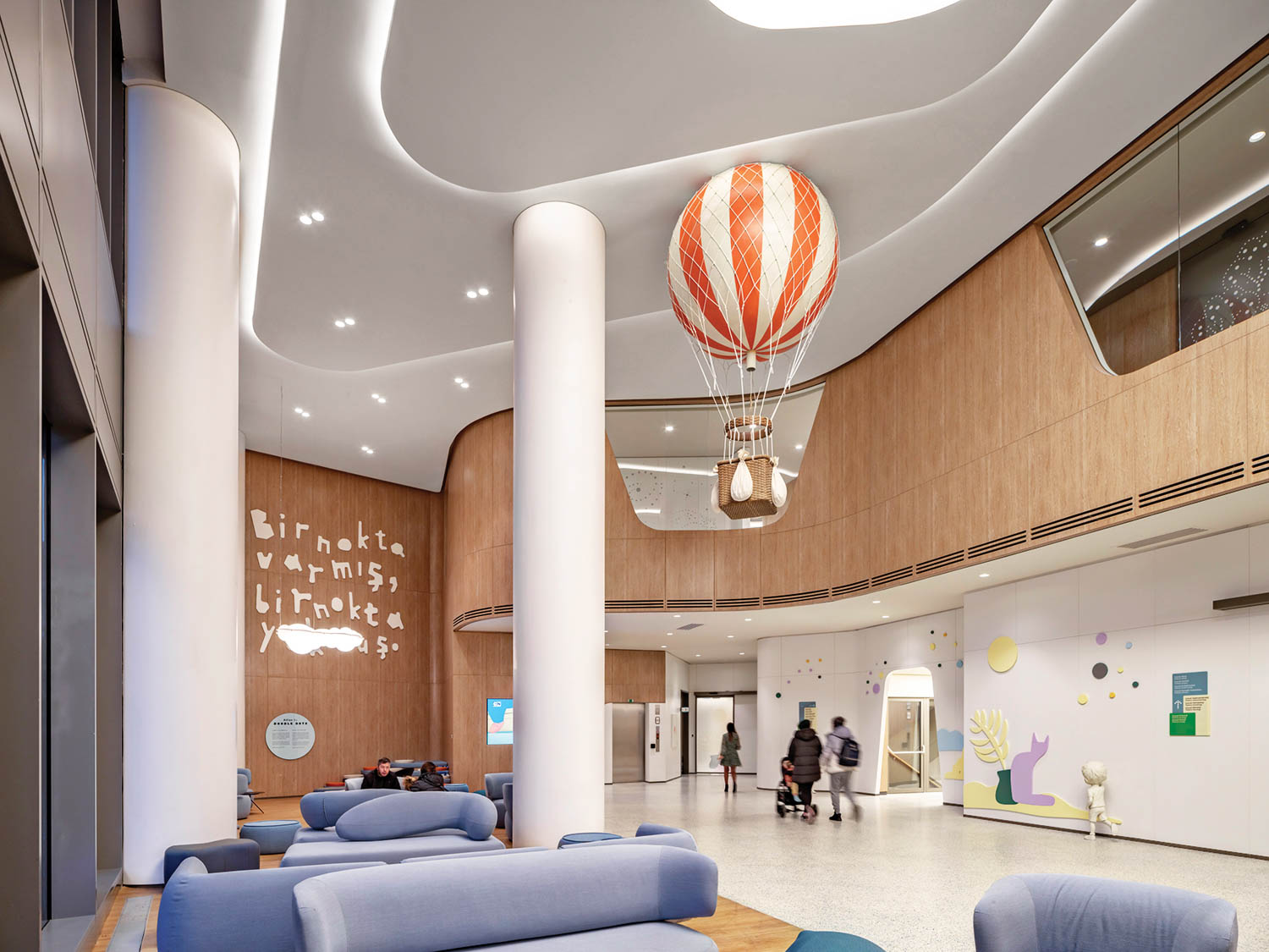 the children's pavilion of Acibadem Healthcare Group with a floating hot air balloon artwork
