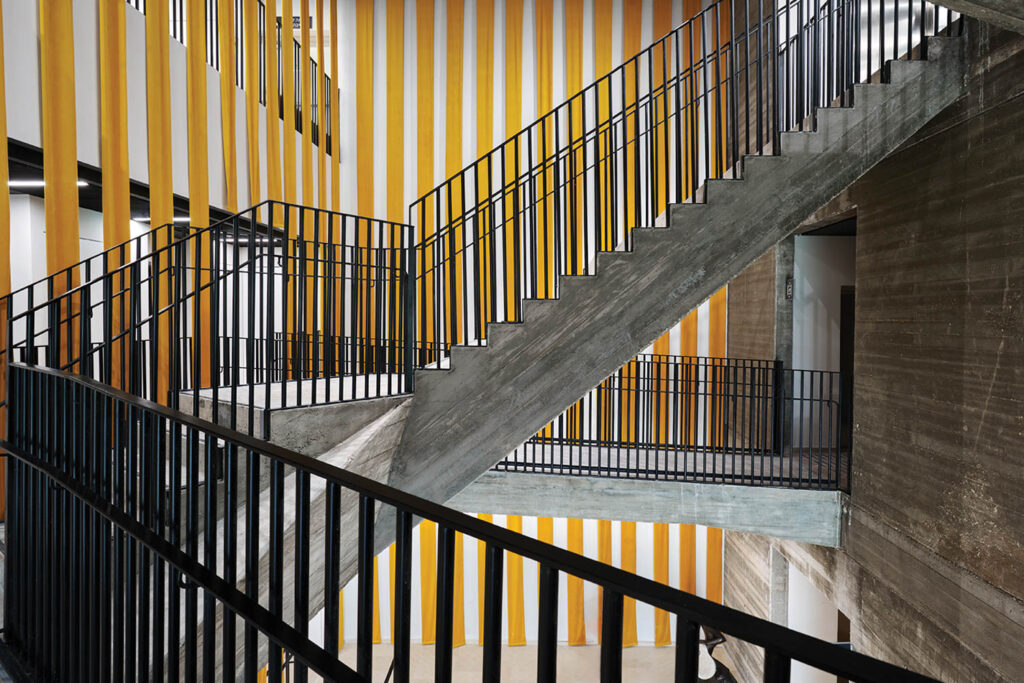 stairs cross throughout the atrium of this addition to the Jerusalem Academy of Music and Dance