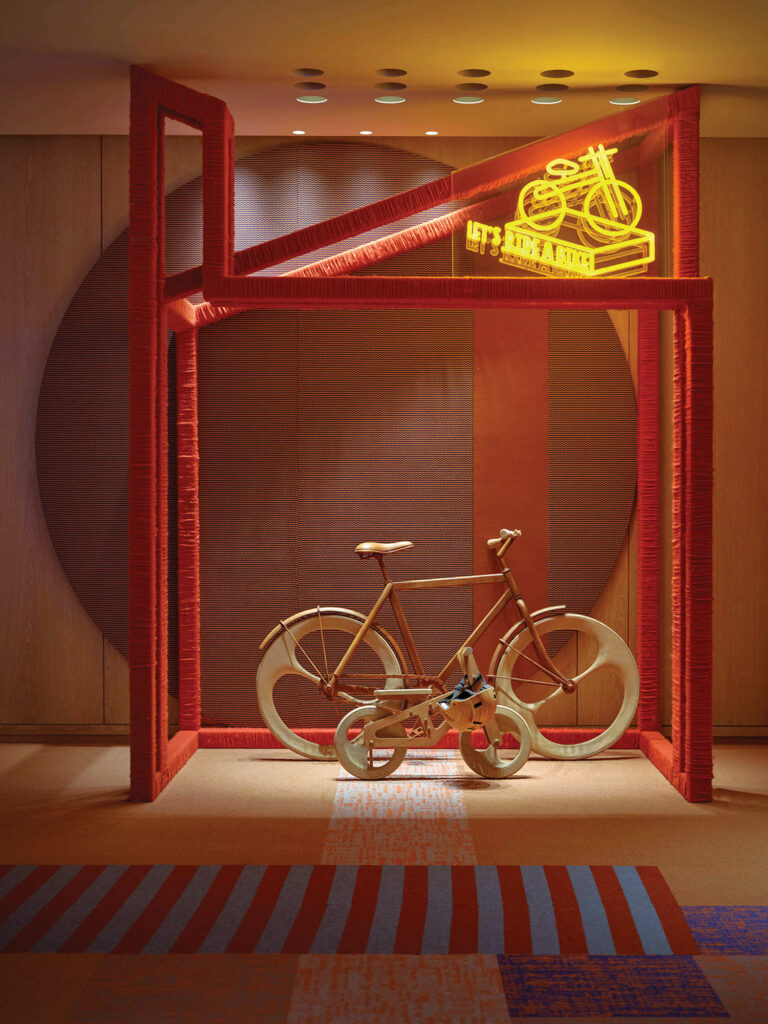 bicycles are part of an installation at this residential sales center