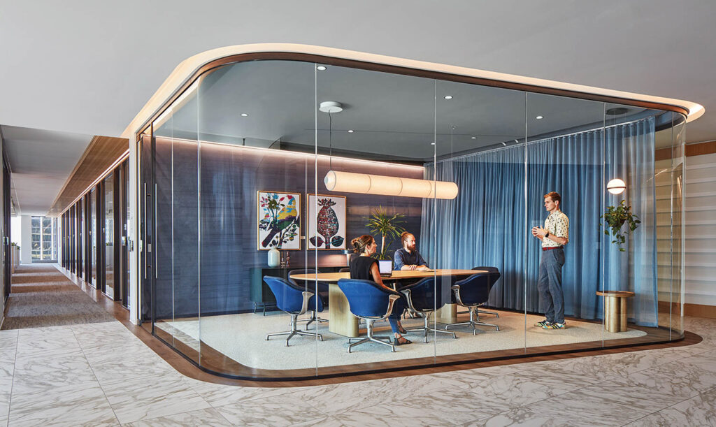 a modern glass-walled conference room