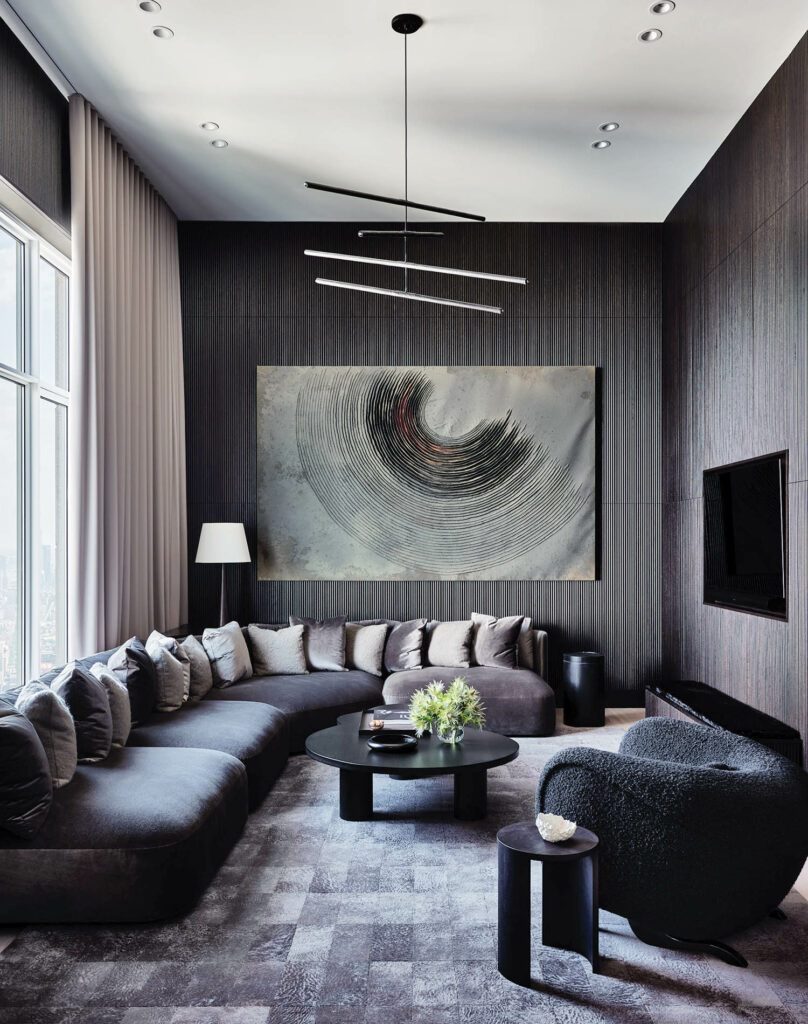 a charcoal grey media room in a New York apartment