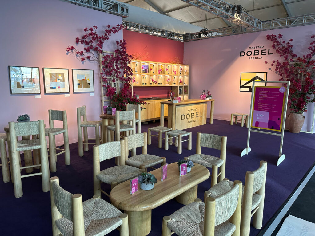 inside the Maestro Dobel presentation at Design Miami/ 2022, featuring furniture inspired by Mexican design in the ‘70s and a bar that serves cocktails