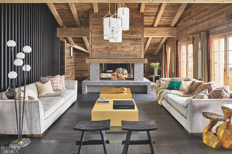 In this rustic living room, a wooden cathedetal ceiling adds depth from above