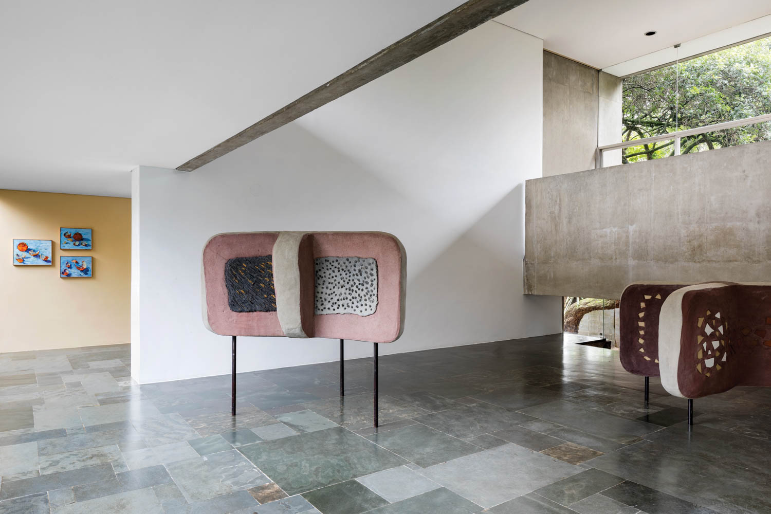 the back of a concrete sculpture in this home/gallery
