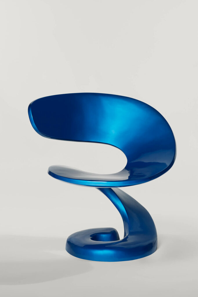 blue ribbonlike chair by Louis Durot