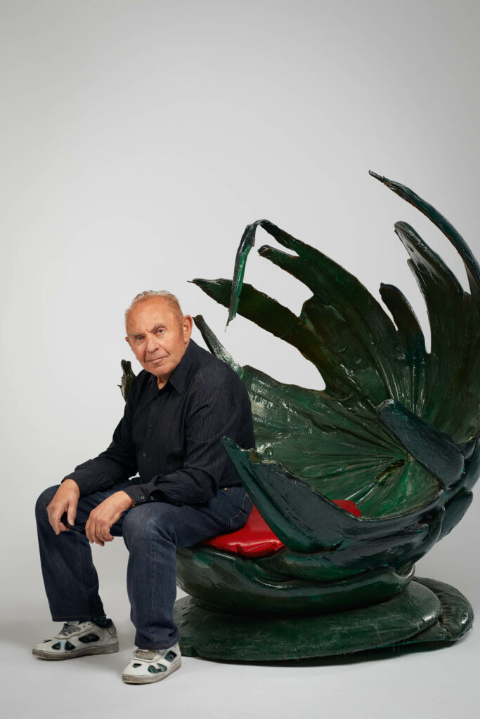 Louis Durot seating in one of his whimsical creations 