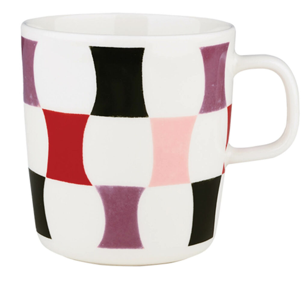a mug with colorful patterns of hour-glass shaped rectangles