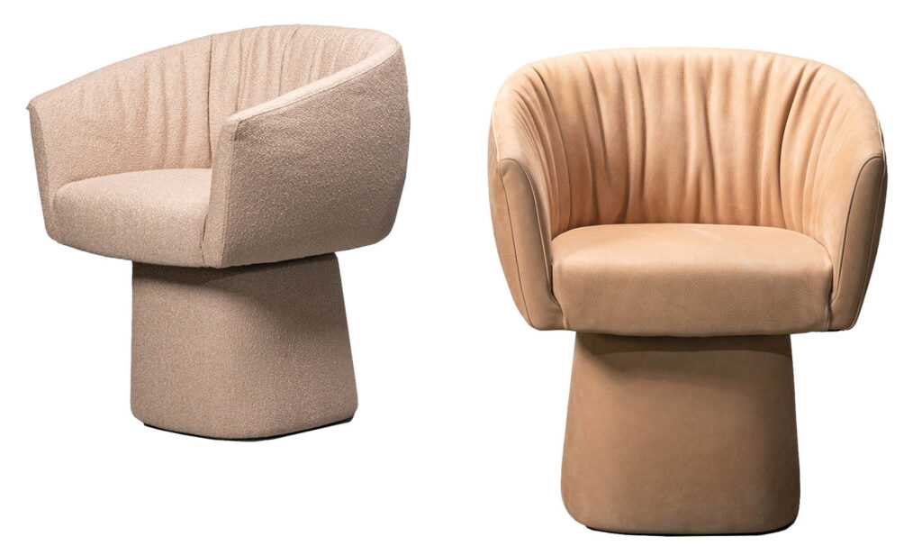 two swivel chairs in a light peach hue