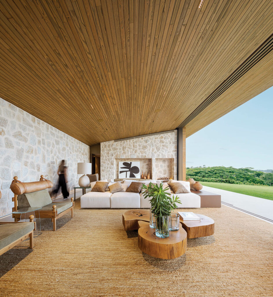 the organic and earthy modern living room of a home on a golf resort