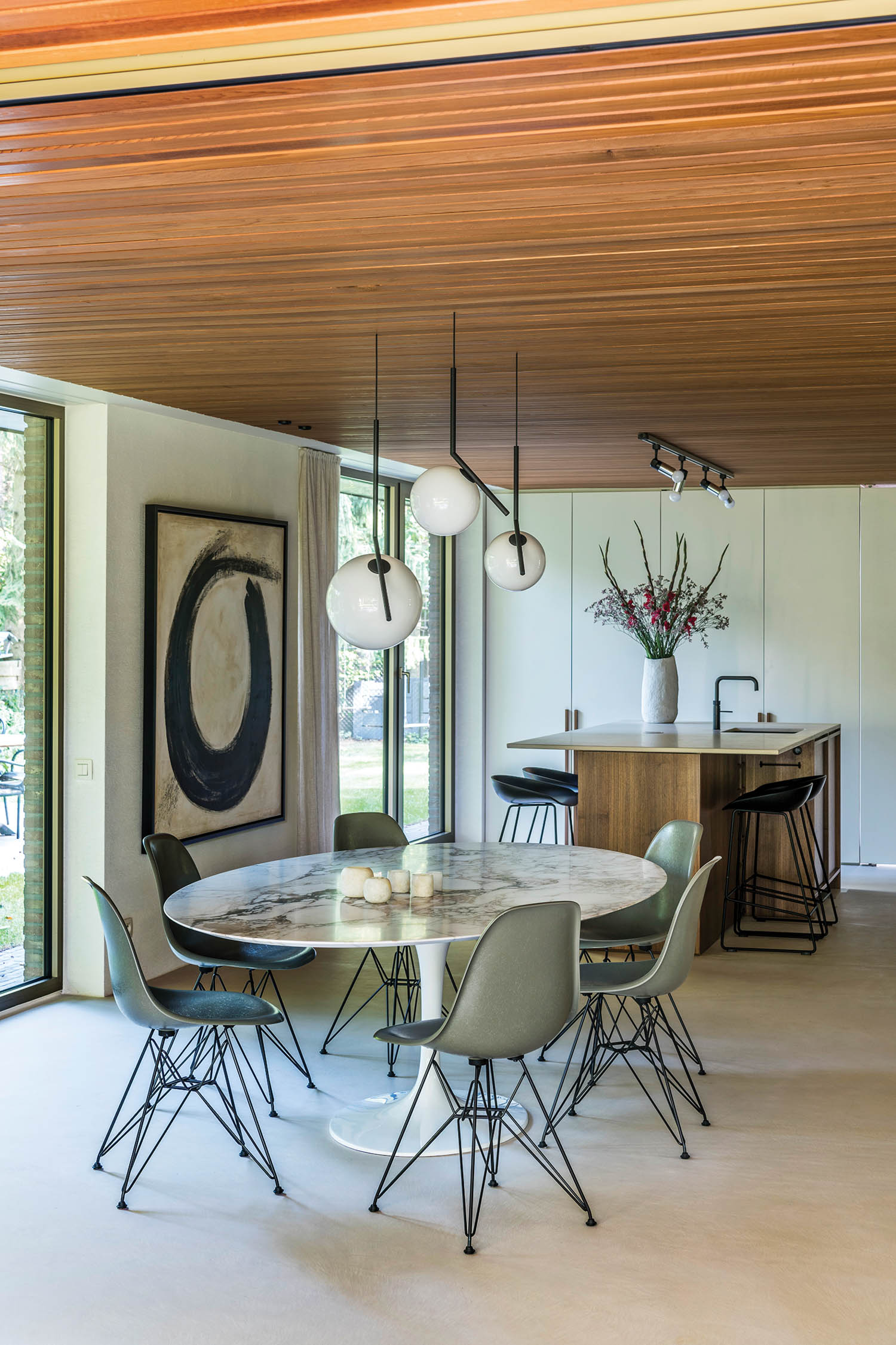 the dining area of a modernized home renovation