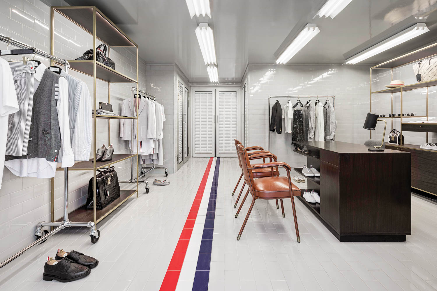 Ceramica Vogue’s System Triangoli Trasparenze series of 4-by-8-inch glossy ceramic tile surrounds the 500-square-foot Thom Browne Saint-Tropez Tennis Pro Shop in France by ASA Studio Albanese.
