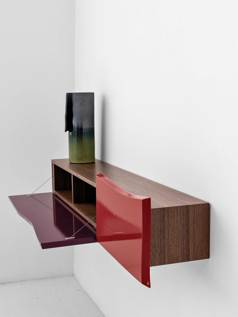 purple and red doors on the front of a shelf by Verso
